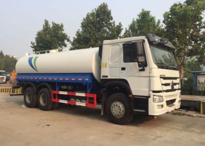 China camión del tanque de agua de 30000L Sinotruk Howo7 con el sistema de espray en venta