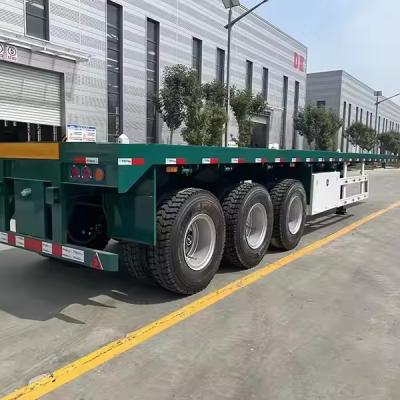 China 40ft 45ft Flat Bed Trailer Another Fuel tank Installed on the Container Flatbed Trailer Bulk Goods Transport Trailer for sale