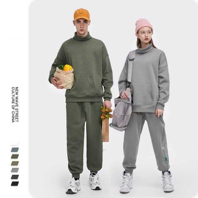 China Breathable Crewneck Sweatshirt Set Unisex Oversized Custom Sweatshirt Pants Hoodies And Track Joggers Tracksuit Gym Clothing for sale