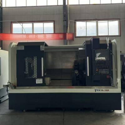 Cina Alto precisione Lathe a letto inclinato 750mm TCK56 10 pollici cilindro idraulico e riposo costante in vendita