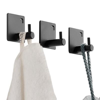 China 2021 Viable Hot Sale Clothes Towel Hook Behind The Door Bathroom Kitchen Wall Rack Hook Multifunctional Metal Glue Hook for sale