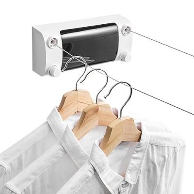 China 2021 Low MOQ Indoor Magic Drying Rack Bathroom Wall Clothes Hanger Space Saving Dual Retractable Clothesline Wire Ropes And Balcony Outdoor for sale