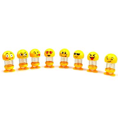 China 7+ car spring action doll car doll and statue swing expression pack toys ornaments wholesale shake head doll for sale