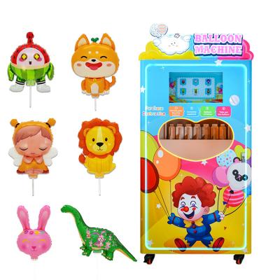 China Máquina de publicidad comercial totalmente automática de tráfico eléctrico globo inflable máquina de venta de autoservicio para promociones en venta