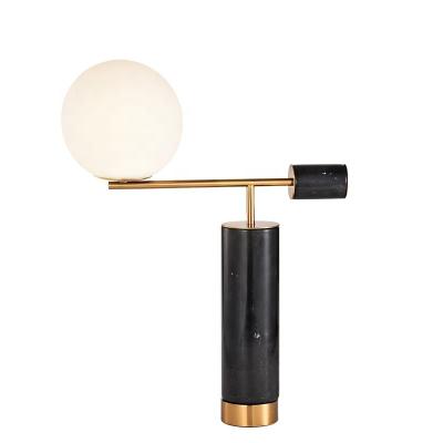 China Residential home decoration glass ball shade table lamp with white/black marble base for sale