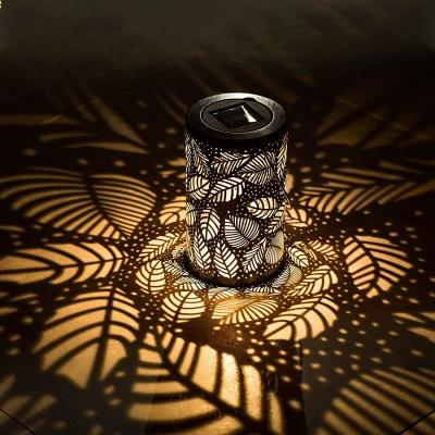 China Garden Outdoor Waterproof Solar Projection Lantern Christmas Gift Metal Leaf LED Metal Leaf Lantern for sale