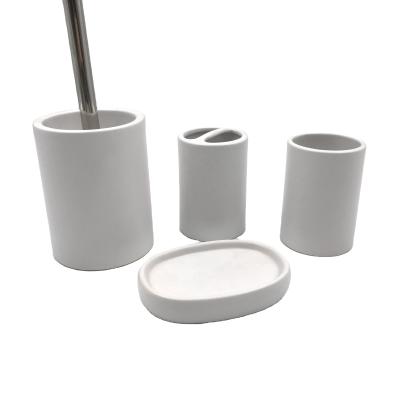 China Sustainable Modern Stylish Four-Piece Bath Accessories White Ceramic Bathroom Set for sale