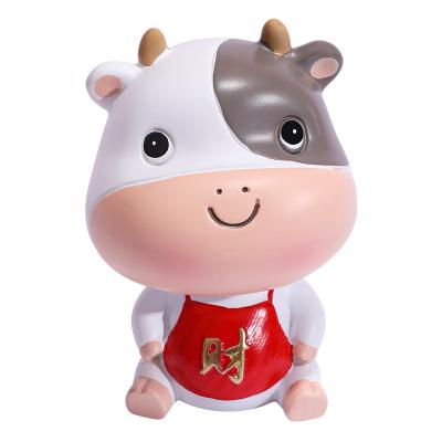 China China Wholesale Shaking Head Car Ornaments Cow Modeling Resin Crafts Ornaments for sale