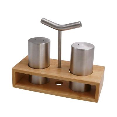 China Sustainable bamboo rack with stainless steel salt and pepper pot for sale