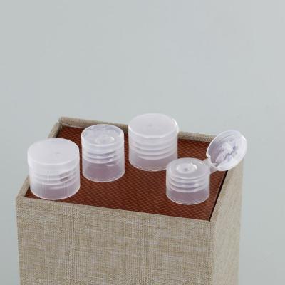 China Personal Care Machine Plastic 38mm Flip Top Cap 1 Ounce Bottle Closure for sale
