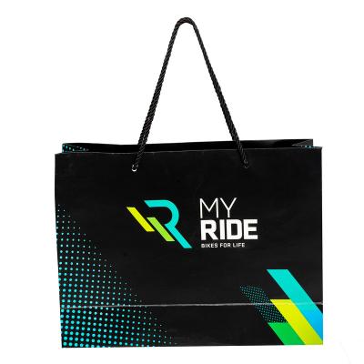 China Disposable Customized Luxury Dark Brown Paper Shopping Bag With Custom Logo for sale