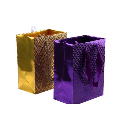 China Biodegradable Hot Sale Christmas Paper Sack Fancy Paper Bag Gift Packaging Paper Bag For Festival With Glittering Powders for sale