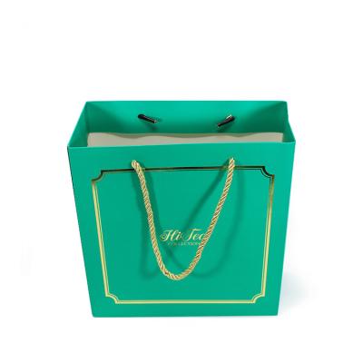 China Custom Wholesale Price Biodegradable Gift Bags Tea Paper Paper Bags With Your Own Logo, Paper Bag With Ribbon for sale