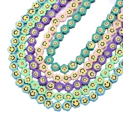 China Jewelry Making 5colors Cute Pattern Printing Flower Shape Beads Polymer Clay Spacer Loose Beads For Necklace Diy Bracelet for sale