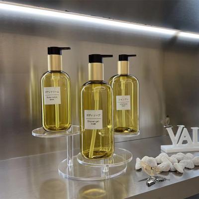 China Cosmetic Gold Translucent Lotion Bottle , Alumina Press Emulsion Pump PET Plastic Empty Lotion Bottle for sale
