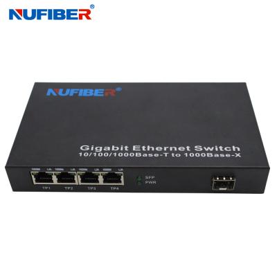 中国 10/100/1000Mの4港Rj45+1 SFPの港の繊維光学のイーサネット スイッチ媒体のコンバーター 販売のため