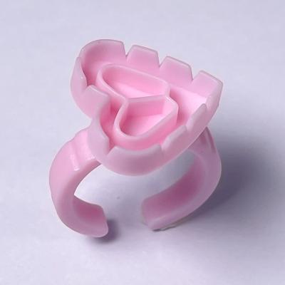 China Anel de tinta de tatuagem em plástico rosa azul com divisão à venda