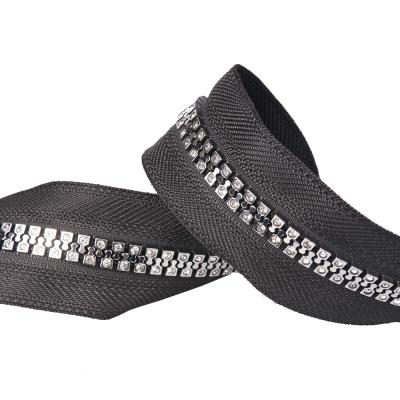 China Color Fade Proof Feature Heavy Duty One Way Plastic Slider Large Teeth Zipper No. 8 Zipper With Diamonds for sale