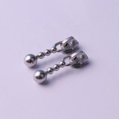 China Wholesale Price Decorative Metal Zipper Puller Slider Recina Nickel Free OEM Customize Zipper Slider for sale