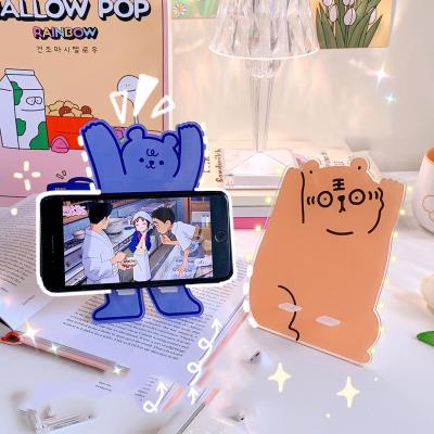 China PORTABLE Special Shaped Tablet Desktop Stand Holder Cell Phone Stand Central Statistical Statistics Lazy Hunting Decorative Ornaments for sale