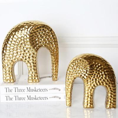 China Art Decor Middle Eastern Style Gold Ceramic Elephant Ornament for sale