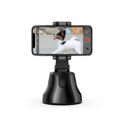China New Design Object Tracking Portable 360 Rotation Auto Face Tracking Smart Phone Holder Shooting Stand for sale