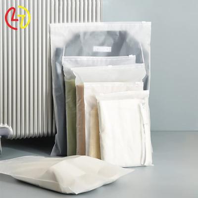 China Factory Wholesale Transparent Moisture Proof Self Seal White T-shirt Clothes Packing Clear Overcoat Plastic Bag for sale