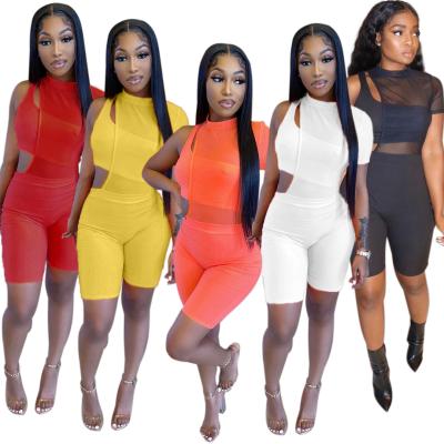 China Hot Selling Breathable Mesh Solid Color Bodycon Stylish Asymmetrical Slatted Two Piece Suit for sale