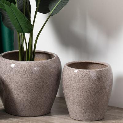 China Decoración casera del diseño creativo moderno alrededor de moldes de cerámica al aire libre interiores de la maceta de los potes de la planta en venta