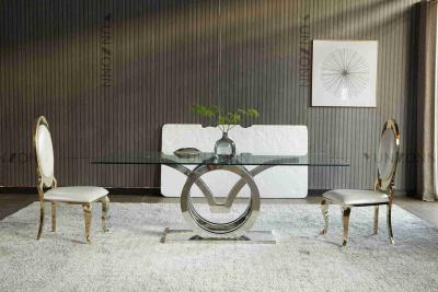 Chine Les mouettes conçoivent la table de salle à manger en verre moderne de luxe de dessus ont placé l'argent de bâti d'acier inoxydable de 4 Seater à vendre