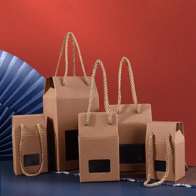 Chine Boîte d'emballage en papier kraft créatif universel Boîte cadeau tasse Boîte de thé et de miel personnalisée à vendre