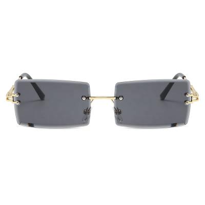 China Hot Trendy Rimless Rectangle gafas de sol 2021 Retro Fashion Sunglasses Shades New Small Women Frameless Sun Glasses for sale