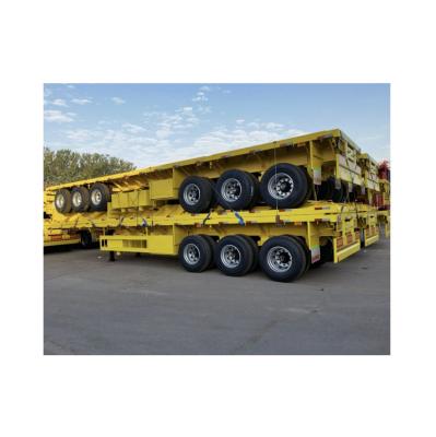 China Max Payload 50tons Hydraulic Lift Flatbed Semi Trailer with Twist Lock and Double Axle for sale