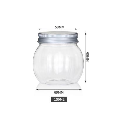 China Unique Jar 150ml Pumpkin Shape PET Food Products Plastic Pumpkin Bottle For Biscuit With Screw Cap for sale