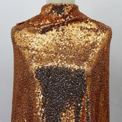China Multicolor anti-static hot sale textile sequin fabric polyester satin fabric with shiny sequin fabric dress for sale