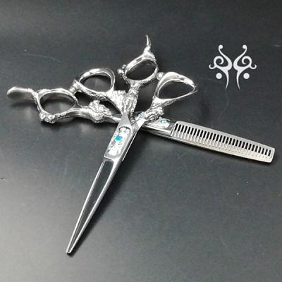 China Hair dressing high quality scissors and classic purple dragon hair scissors for sale
