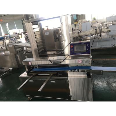 China High Quality Frozen Food Machine LM-260 Automatic Frozen Biscuit LM-260 Tray-Arranging Machine for sale