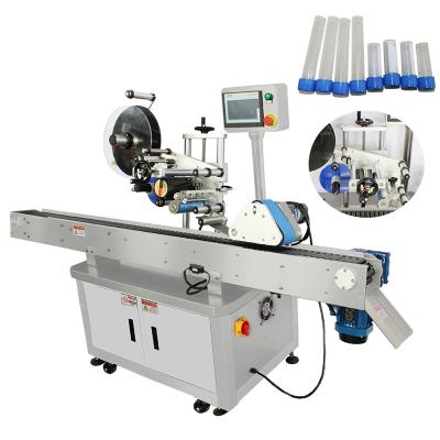 China Food Good prices automatic oval bottle filling capping and labeling machine label sticker label machine for plastic cup for sale