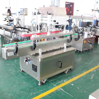 China Food Full automatic vegetable oil filling and labelling machine stripe glass bottle and flat bottle label equipment for sale