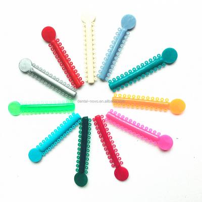 China Best Quality Orthodontic Elastic Dental Orthodontic Materials Plastic Orthodontic Ligature Bond for sale