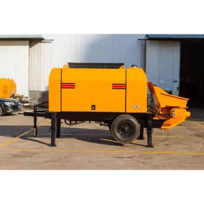 China Bomba de hormigón automática montada en tractor Línea de cemento Bomba de autocarga en venta