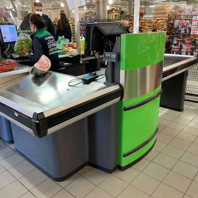 China Supermarket design retail cash register cold rolled steel table checkout cashier counter desk with conveyor belt for sale for sale