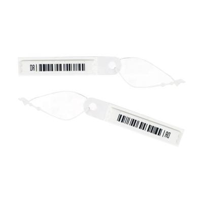 China AM Security Soft Label EAS 58KHz 60 X 11 X 2mm With String Bar Code for sale