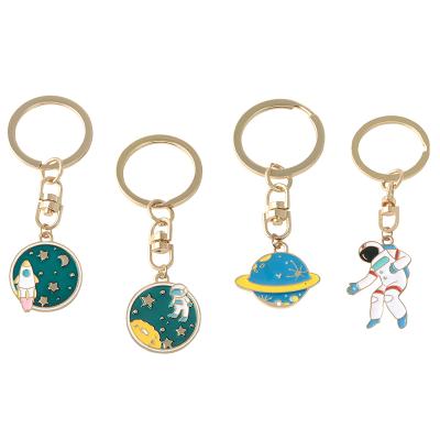 China Metal uzay toptan key chain keychain Rocket Planet Chains Cute Metal Cartoon Astronaut Pendant Childish Metal Space Travel Pendant for sale