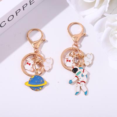 China New 2021 Metal Astronaut Keychain Custom Bunny Rocket Moon Cloud Charm Keychain Keychain Women Men Accessories For Space Lover for sale