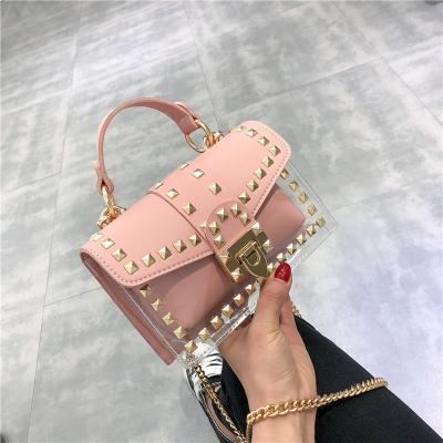 China High Quality Fashion Messenger Bag Chain Women Rivets Clear Square PVC Jelly Bag Shoulder Bag Transparent Handbag for sale
