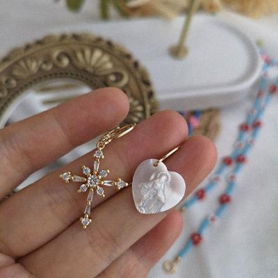 China Fashion 14K Gold Plated Asymmetrical White Zircon Cross Butterfly Shell Drop Earrings for sale