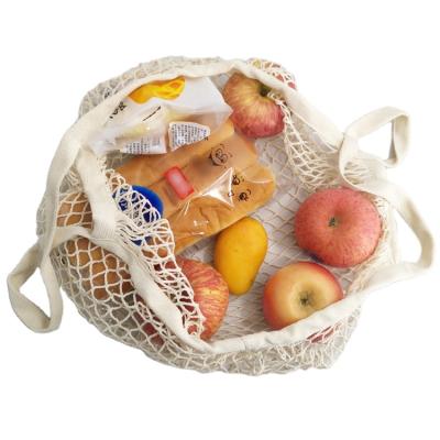 China Shopping Recyclable Small Cotton Fabric Mesh Drawstring Bags With Customized Reusable Logo for sale