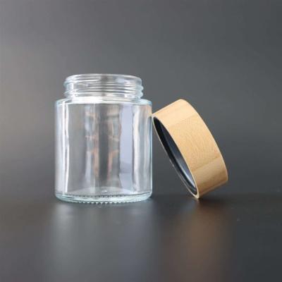 China Childproof 4oz Bamboo Lid Glass Jar Airtight Flower Jar for sale