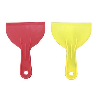 China Economic Viable Yellow-Orange Scraper ABS Plastic Spatula for sale